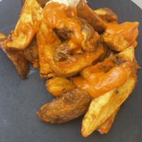 Patatas bravas   at Shambala Lounge Bar in Cuenca