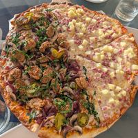 Half Hawaiian, half vegan pizza (caramelized onions, beyond sausage, cheese which tastes like daiya), jalapenos)  at Yachtsman Grill in Cotton Ground