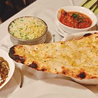 Pilau Rice, garlic Naan, palak paneer and tadka daal. at Everest Spice in Fuerteventura