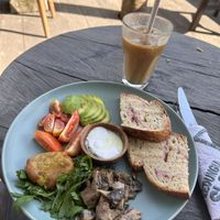 The big breakfast plate - vegan version and an iced latte with oat milk  at Little Ripper Cafe in Tabanan