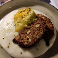 Polpettone di fagioli borlotti e capperi con pure patate e verza arrostita at FITO - Ristorante Vegetale e Cocktail Bar Botanico in Castiglioncello