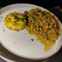 Bocconcini di soia in umido con cardi con tortino di patate e limone at FITO - Ristorante Vegetale e Cocktail Bar Botanico in Castiglioncello