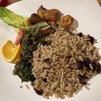 Calloo and okra dish with plaintain, rice and peas (beans)   at Kool Runnings Jamaican Restaurant in Inverness