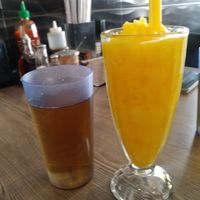 Cold slushy mango drink and free hot jasmine tea at  Viet Quan in San Francisco