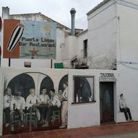 Sign and wall art at Puerto Limon in Palafrugell