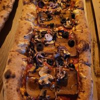 Fake meat, olives, vegan cheese, onions and mushrooms. at Pizzatopia - Grodzka in Krakow