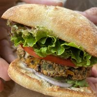 Bean Burger made of quinoa. Sun the cheese with avocado but vegan cheese is available . at Soto's True Earth Market in Cambria