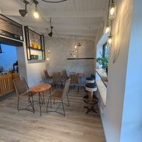 Inside seating at Club E Café de Especialidad in Esquel