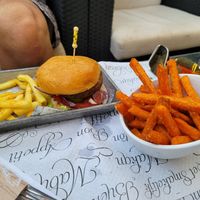 Vegan burger with vegan fries and sweet potato fries at Tango in Calpe