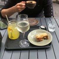 Maracuja-mango juice, Weinschorle, Coffee w oat milk, banana-zuccini-cake  at Heinrich essen & trinken in Konstanz