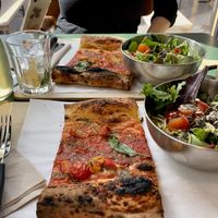 Menü 3: 1 Stück Pizza (vegan), Salat & Hauseistee CHF 13.50  at VITO Europaallee in Zurich