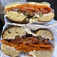 Bagel with carrot “lox”, schmear, capers tomato & dill  at Ben & Esther's Vegan Jewish Deli in Oceanside