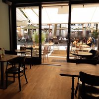 Outdoor seating in the back at Bar Alltag in Winterthur