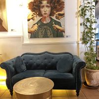 They have really cool paintings, makes the whole Restaurant a interesting and cozy space  at Antù in Lisbon