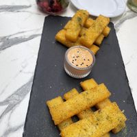 Polenta chips with Sriracha mayo  at Antù in Lisbon