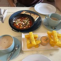 Polenta sticks and vegan shakshouka  at Antù in Lisbon