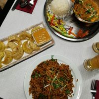 Biriani rice, veg dumplings and fried noodles at Dumpling House in Lagos