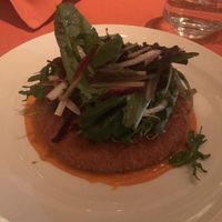 “ Ricotta “ cake (almond based) with greens  at Wynn Hotel - Sinatra in Las Vegas