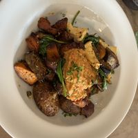 Tofu scramble with roasted pumpkin, among other veggies and hummus on top    at Café Tennyson + Bistro in Napier