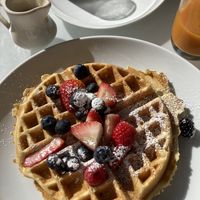 A Vegan Waffle with Maple Syrup and Berries  at Wynn Hotel - Terrace Pointe Cafe in Las Vegas