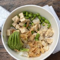 A small bowl with sweet sesame tofu  at Poke Chop in Encinitas