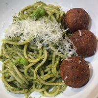 Spaghetti pesto w side of eggplant meatballs  at Foglia in Bristol