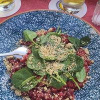 Risotto with red beetroot, spinach and Cashews at Königlicher Hirschgarten in Munich