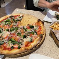 Large veggie pizza and a basket of fries  at Roman's Pizza House in Cape May