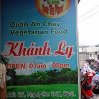 banner at the end of the street with opening hours at Khanh Ly Vegetarian Food in Phu Quoc