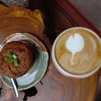 Vegan and gluten-free carrot cake and a cappuccino with chestnut milk at Indie Café and Concept Store in Cusco