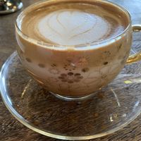 Good almond milk coffee   at Flourish Cafe in Ubud
