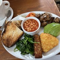 Their vegan breakfast was amazing and included sunflower butter for the toast. They have oat milk for all their coffees. The location is right on the water   at Bandstand Brighton in Brighton