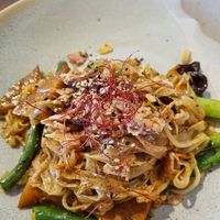 Wok tossed wide flat rice noodles with woodear mushroom,  choy sum, sesame, soy and added tofu #Veganuary at Little Sister in Cairns