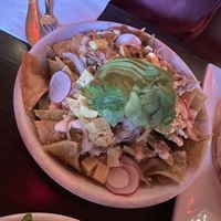 Vegan chilaquiles off Guevara’s section of the menu, sit-down dining at Mekelburg’s  at Guevara's - Domino Park in Brooklyn