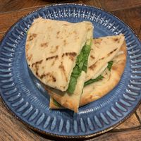 Cheese and spinach flatbread   at Smiley Vegan Rundle Mall in Adelaide