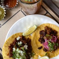 Vegan Campechano & Vegan Carnitas (with pickled onions and roasted pineapple) are best sellers. Served with 3 kinds of salsa. Drinks (Yuzu iced tea) from another establishment.  at La Chinesca - The Grid Rockwell in Makati
