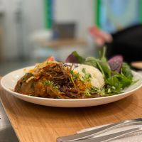 Vegitable curry made with organic spices, soy meat, dal, onions and brown mash rooms come with brown rice and salad.  at ONE EARTH in Hiroshima