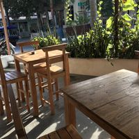 Tables outside  at The Juice Bar by Bajo Bloom in 