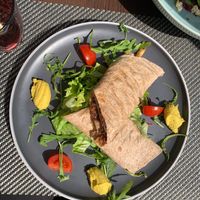 Vegan Wrap with chickpea, hummus, vegetable stir-fry, tofu cheese.  at Restaurant Golden Rose in Krk