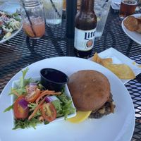 black bean burger with side salad  at The Sackets Boathouse Restaurant & Bar in Sackets Harbor