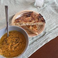 Carrot soup and focaccia   at Green Life Market in Sarande