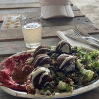 Falafels, beet root hummus, and salad    at Green Life Market in Sarande