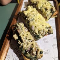 Vegan pizza with tofu at Pawdy Neighbors  in Dubai