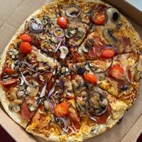 Individualized pizza with vegan salami  at Domino's Pizza in Ingolstadt