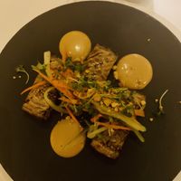 Eggplant stuffed with impossible meat and curry sauce  at Wynn Hotel - Lakeside in Las Vegas