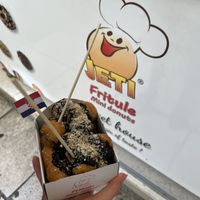 Fritule with chocolate sauce and crushed hazelnuts   at Jeti Sweet House Zadar in Zadar