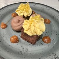 Brownie dessert with chocolate and mango mousse at L'Evangelista Ristorante & Enoteca in Verona