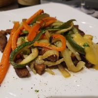 Tempeh with vegetables at Osteria di Fuori Porta in Padua
