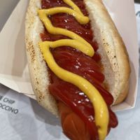 Hot dog. Maybe too much sauce?😄 at Vegan Burger - Dubai Mall in Dubai