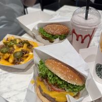 Smoky Bakon burger, cheesy fries & strawberry shake.  at Vegan Burger - Dubai Mall in Dubai